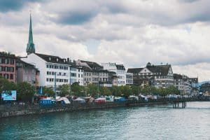 A photo from a bridge in Zurich on a cloudy day showcasing Switzerland in November.