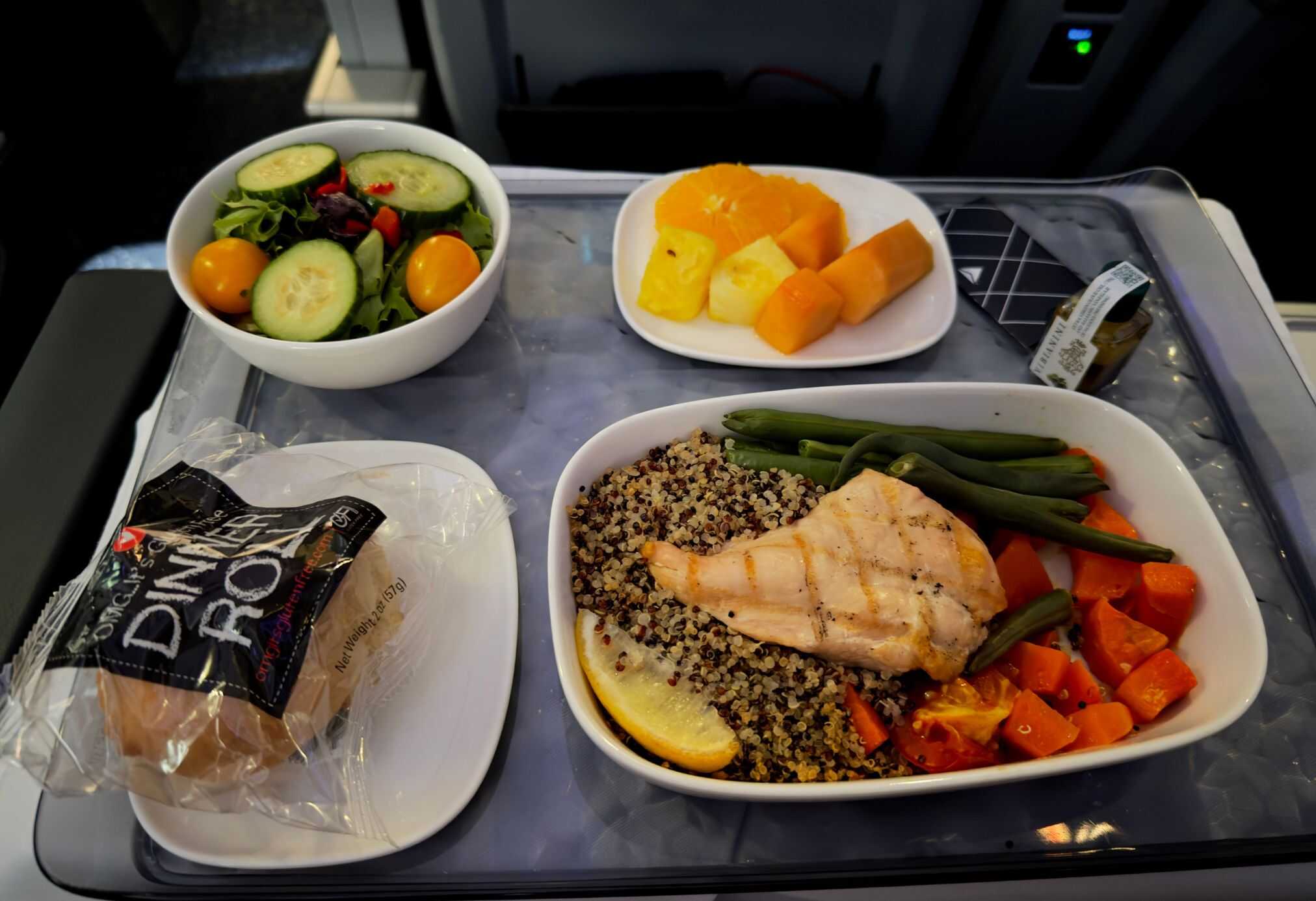 A dinner meal in Delta's Premium Select seat on a long-haul flight.