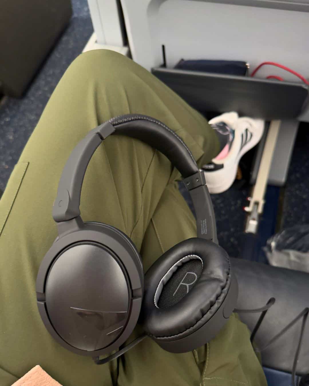 The noise-cancelling headphones in Premium Select on Delta's flight are much better than the main cabin.