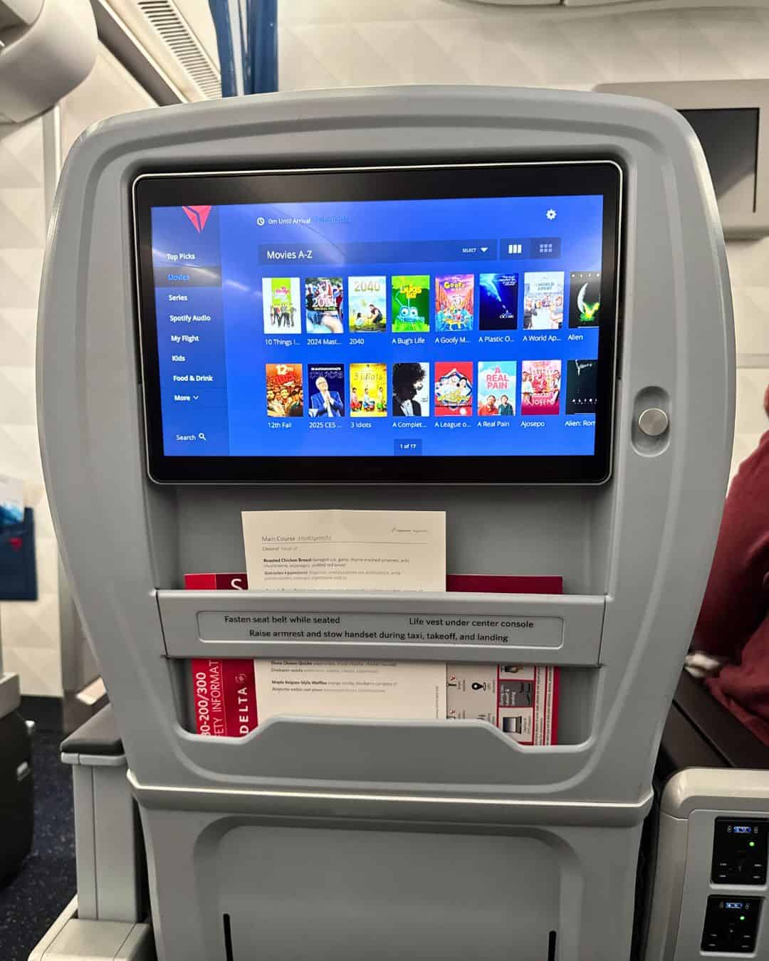 Showcasing the larger screen with more movies in the Premium Select section on a Delta flight.