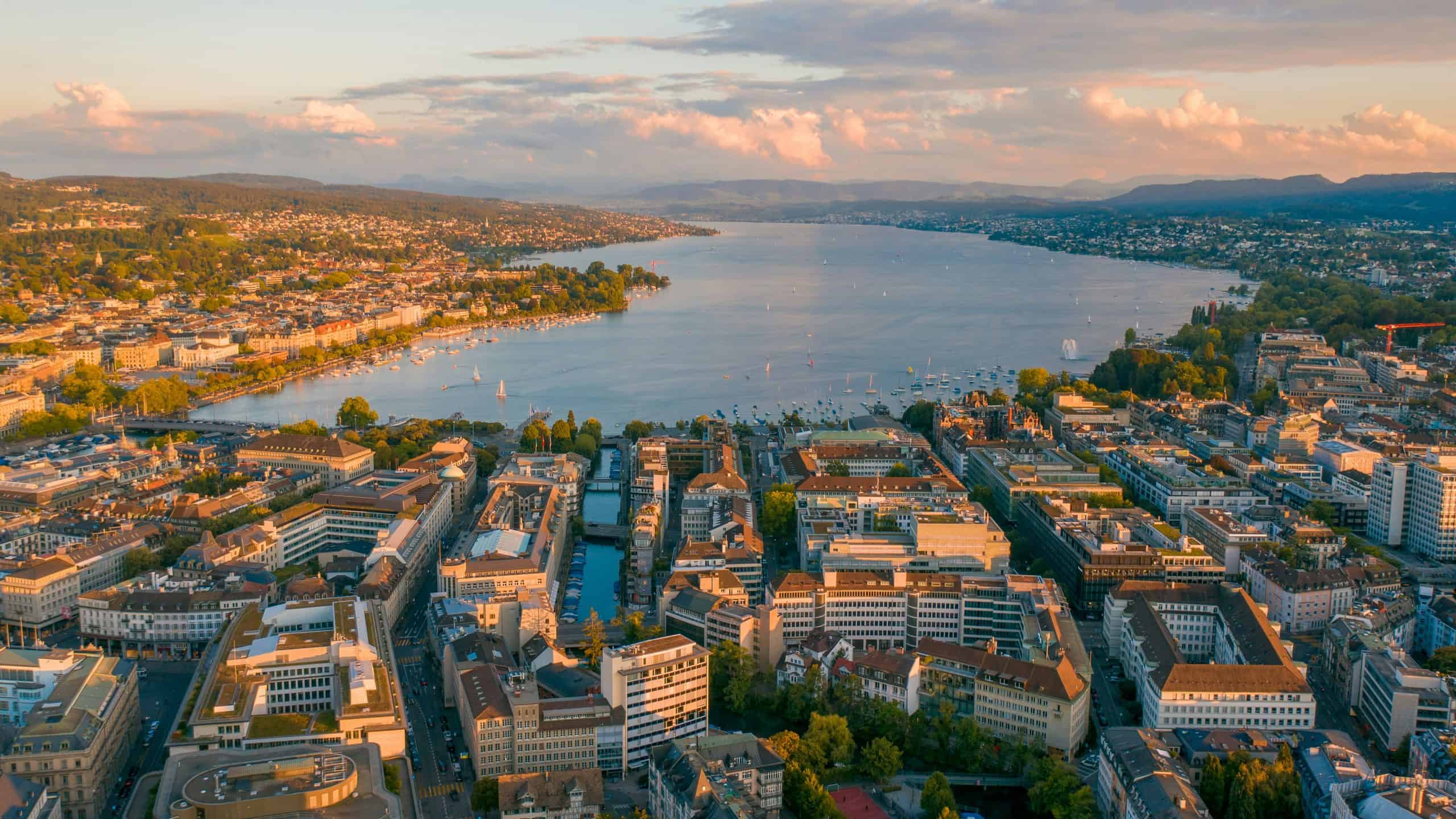 A beautiful view of Zurich in summer at sunset. The view is from the Uetilberg mountain in Zurich, Switzerland. 