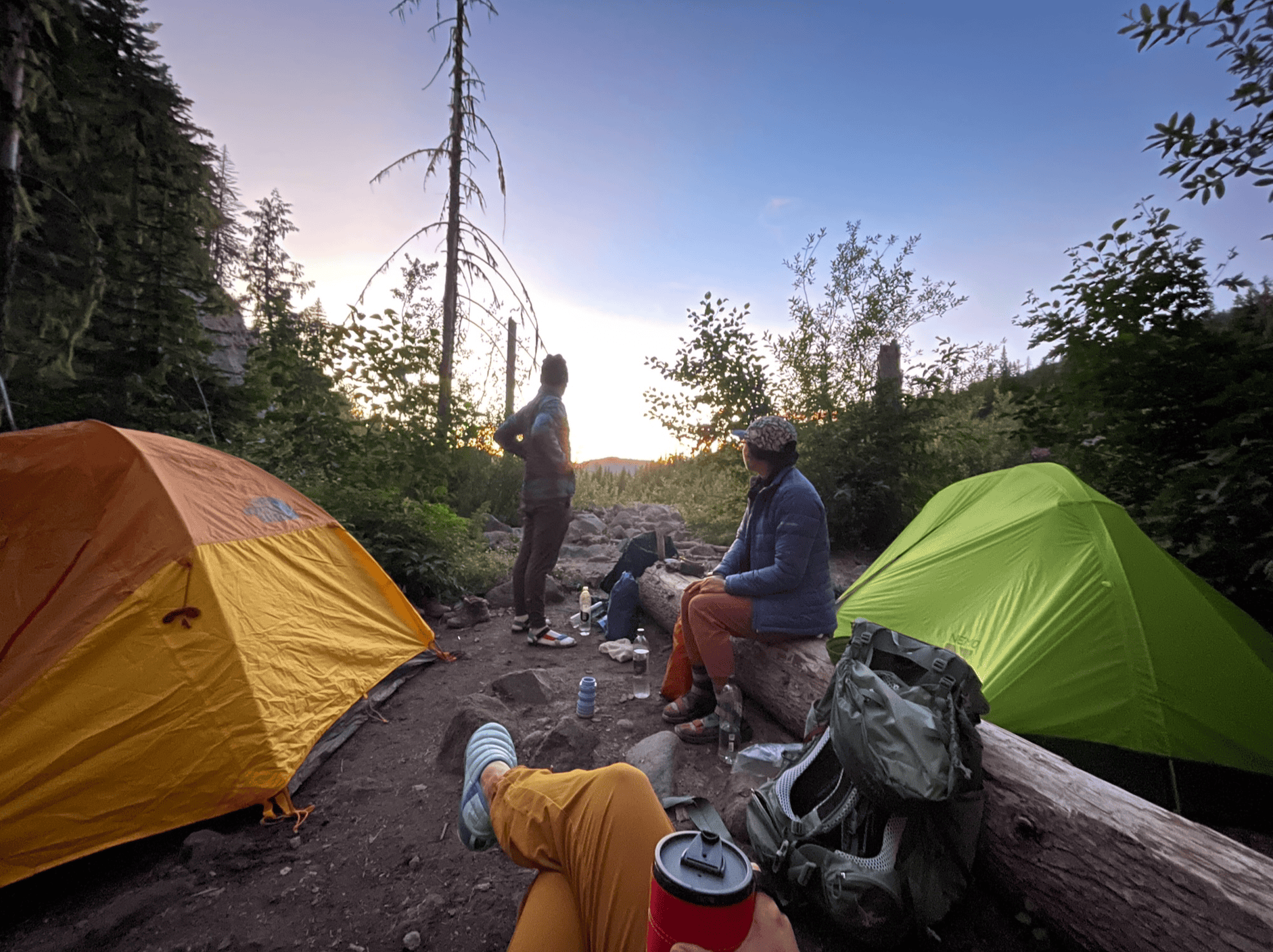 Friends at camp on a beautiful early fall evening admiring the views from camp.