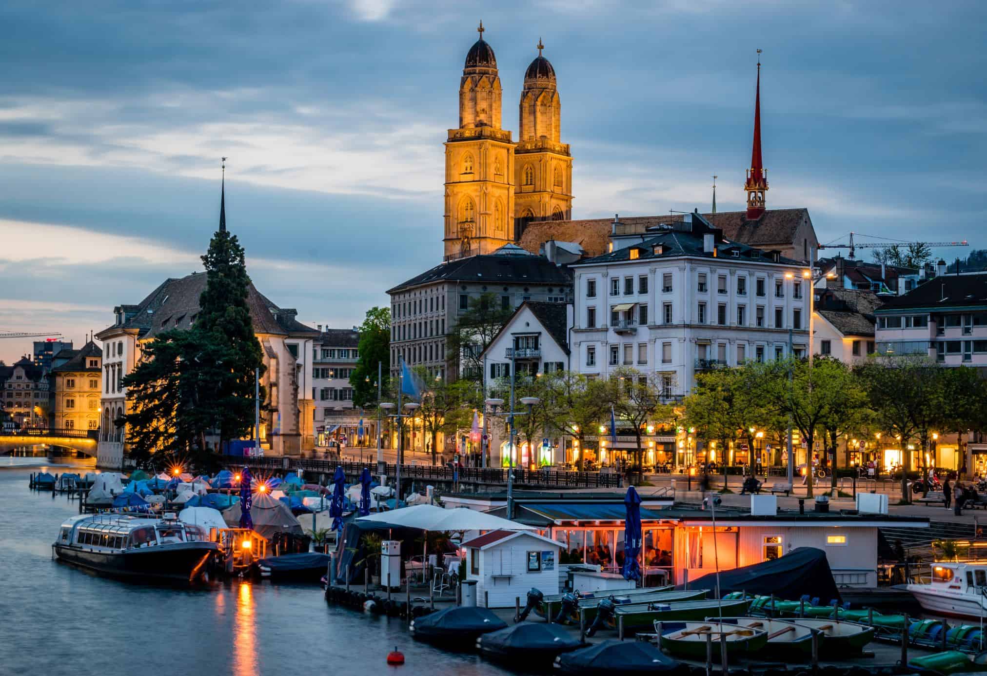 Zurich is one of the most common cities to visit in all of Switzerland. There is a reason that this city is on this 7 day Switzerland winter itinerary. It is magical this time of year with twinkling lights reflecting off the lake and holiday cheer.