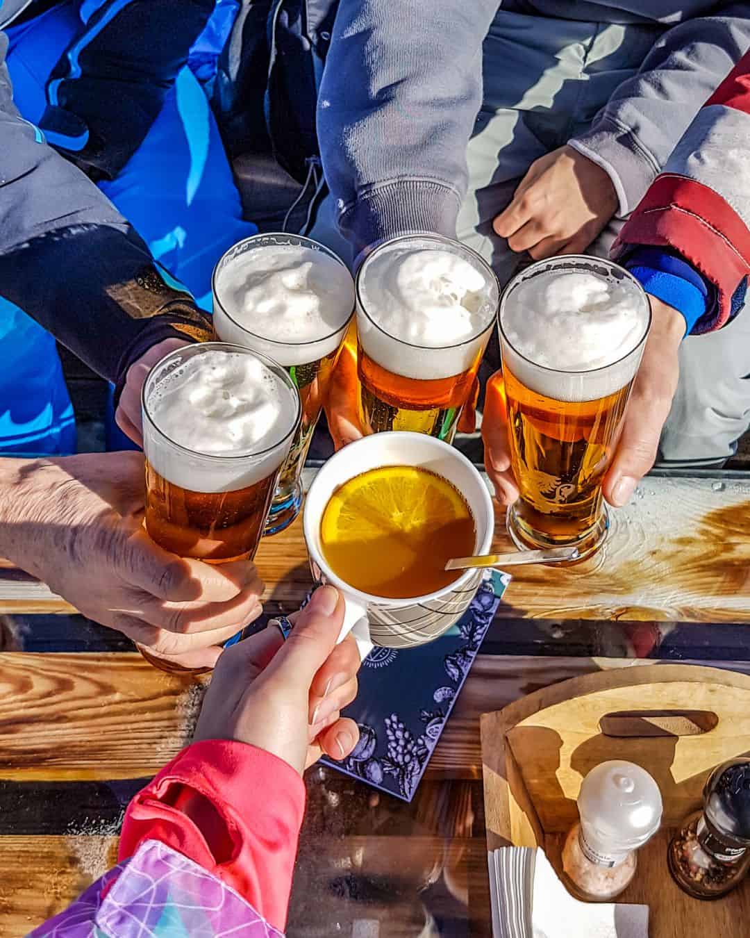 Friends gathering together after a long day skiing. Follow up with a classic apres-ski after a long day on the mountain.